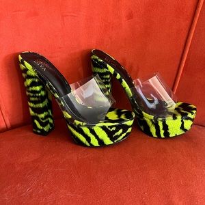 Neon green and black heels. Never worn.